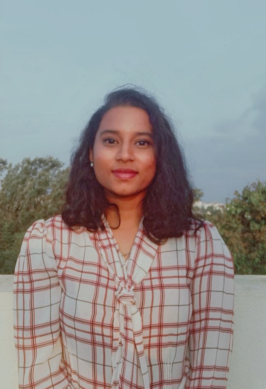 Nidhi T